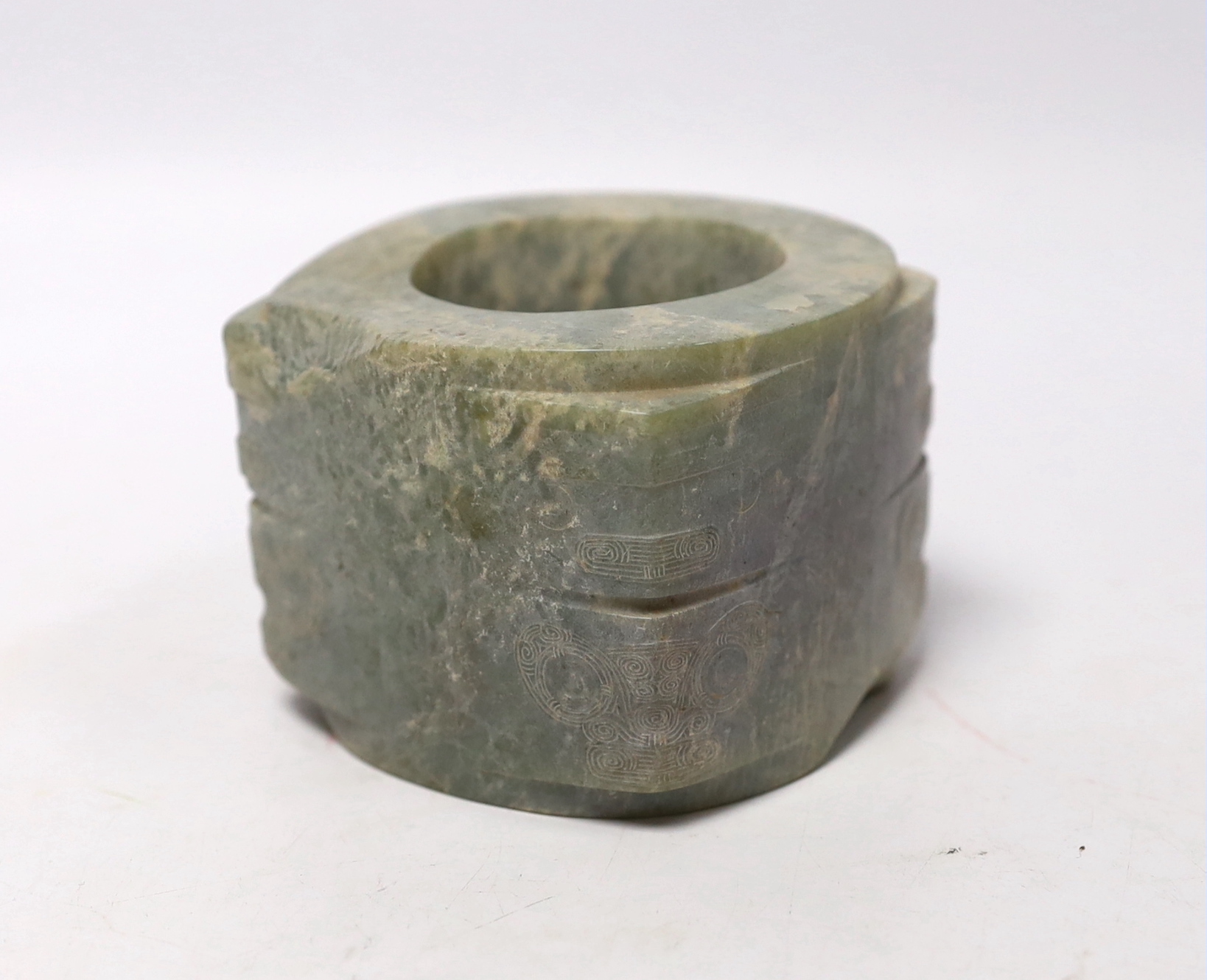 A Chinese jade cong, in a case, 6cm high